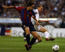 Zidane,  la lutte avec Xavi, n'aura tenu qu'une mi-temps... - AFP-Christophe Simon